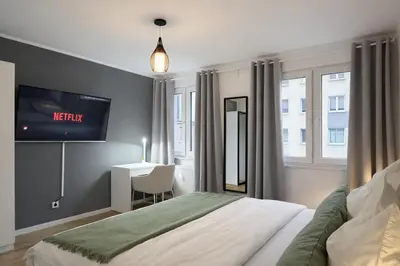 Ein Bett oder Betten in einem Zimmer der Unterkunft Großzügiges Apartment am Limbecker Platz mit Cafés, Top Anbindung & Netflix