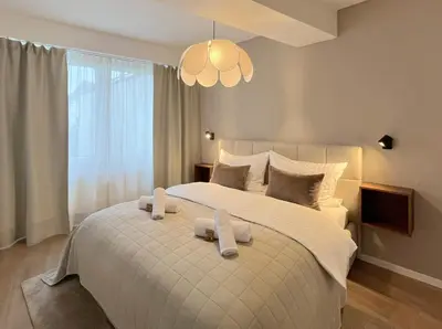 Ein Bett oder Betten in einem Zimmer der Unterkunft Seestadt Apartment I Sauna I Parkplatz I Zentral