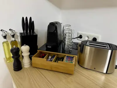 Küche/Küchenzeile in der Unterkunft Charmante Unterkunft mit 2 Schlafzimmern, Smart-TV, WLAN