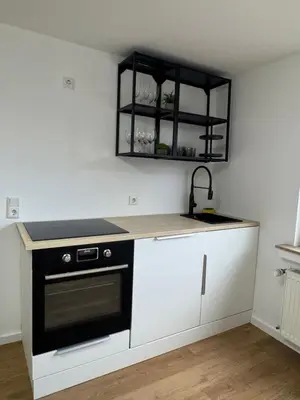 Küche/Küchenzeile in der Unterkunft Charmante Unterkunft mit 2 Schlafzimmern, Smart-TV, WLAN
