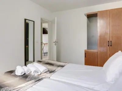Ein Bett oder Betten in einem Zimmer der Unterkunft Apartment in Oberhausen near a Lake