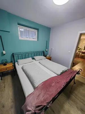 Ein Bett oder Betten in einem Zimmer der Unterkunft Ferienwohnung Am Heimathof