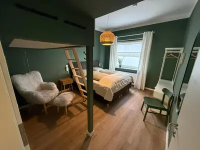 Ein Bett oder Betten in einem Zimmer der Unterkunft Chez Frédéric