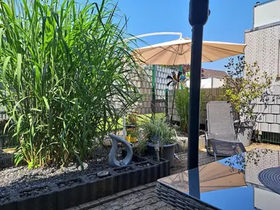 Ein Garten an der Unterkunft Schneeglöckchen