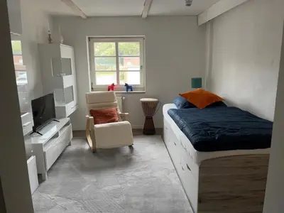 Ein Bett oder Betten in einem Zimmer der Unterkunft Neu! Alter Kornspeicher
