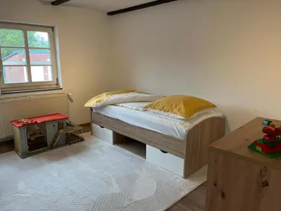 Ein Bett oder Betten in einem Zimmer der Unterkunft Neu! Alter Kornspeicher
