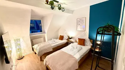 Ein Bett oder Betten in einem Zimmer der Unterkunft Copper Loft - Rüttenscheid, Messe, zentral