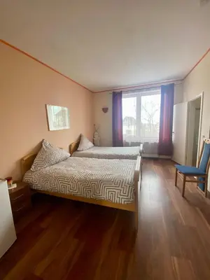 Ein Bett oder Betten in einem Zimmer der Unterkunft Hotel An der Lantert