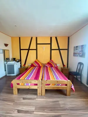 Ein Bett oder Betten in einem Zimmer der Unterkunft Hotel An der Lantert