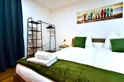 Ein Bett oder Betten in einem Zimmer der Unterkunft SANO - Hagen - Am Rastebaum