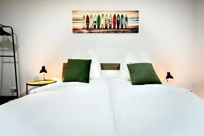 Ein Bett oder Betten in einem Zimmer der Unterkunft SANO - Hagen - Am Rastebaum