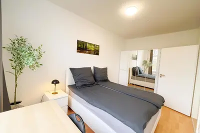 Ein Bett oder Betten in einem Zimmer der Unterkunft Messe Dus - 3 Rooms - 80qm - Sportpark Wedau