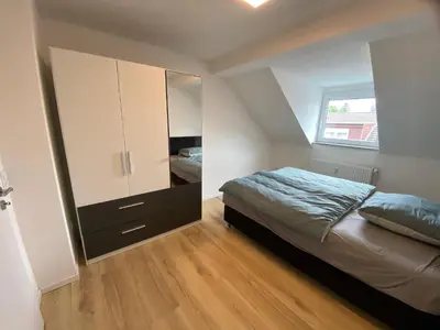 Ein Bett oder Betten in einem Zimmer der Unterkunft Minos Unterkunft