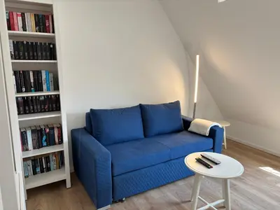 Ein Sitzbereich in der Unterkunft Ruhiges und citynahes Dachgeschoss-Nest