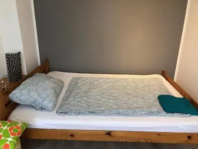 Ein Bett oder Betten in einem Zimmer der Unterkunft Big House in Duisburg - maximal 6 Persons with Garden