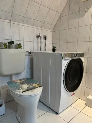 Ein Badezimmer in der Unterkunft Mirko City Center Apartment