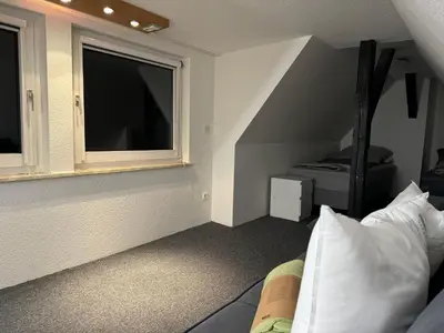 Ein Bett oder Betten in einem Zimmer der Unterkunft Mirko City Center Apartment