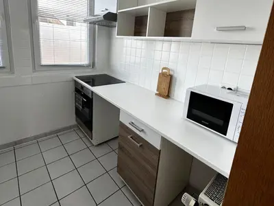 Küche/Küchenzeile in der Unterkunft Apartments für beruflich Reisende