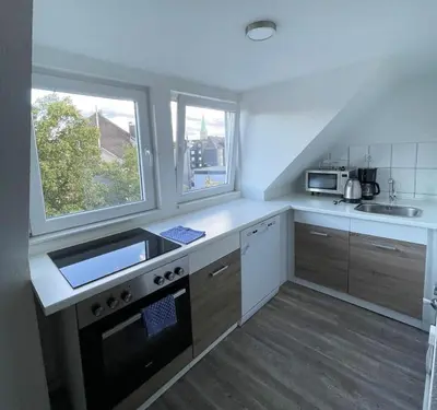 Küche/Küchenzeile in der Unterkunft Apartments für beruflich Reisende