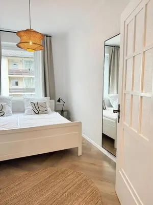 Ein Bett oder Betten in einem Zimmer der Unterkunft Helle Altbauperle zwischen Köln & Düsseldorf