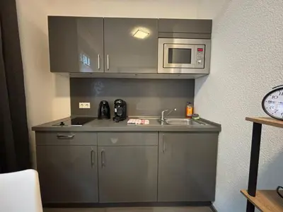 Küche/Küchenzeile in der Unterkunft StayBaran City Apartment Bochum 2