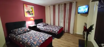 Ein Bett oder Betten in einem Zimmer der Unterkunft Die Hotelalternative Michael Treiber 5