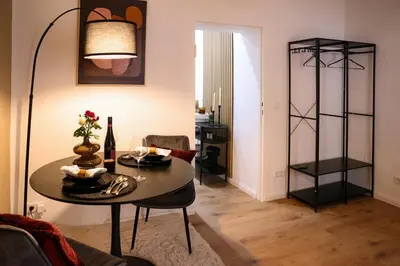 Ein Sitzbereich in der Unterkunft Arden Stay Apartments
