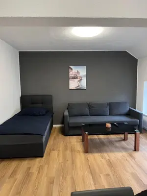 Ein Sitzbereich in der Unterkunft Ferienwohnung Ruhrperle
