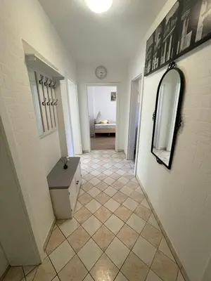 Ein Bett oder Betten in einem Zimmer der Unterkunft Ferienwohnung Emma