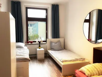 Ein Bett oder Betten in einem Zimmer der Unterkunft Spacious and Comfy Apartment in Wuppertal