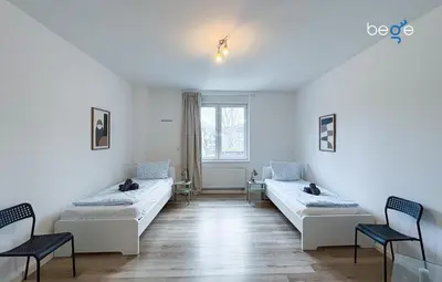 Ein Bett oder Betten in einem Zimmer der Unterkunft BEGE APARTMENTS IdeaHaus