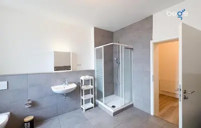Ein Badezimmer in der Unterkunft BEGE APARTMENTS IdeaHaus