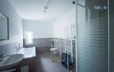 Ein Badezimmer in der Unterkunft BEGE APARTMENTS IdeaHaus