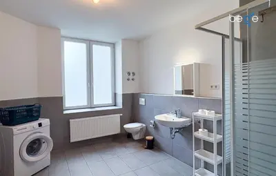 Ein Badezimmer in der Unterkunft BEGE APARTMENTS IdeaHaus