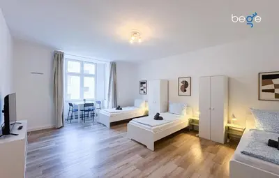 Ein Bett oder Betten in einem Zimmer der Unterkunft BEGE APARTMENTS IdeaHaus