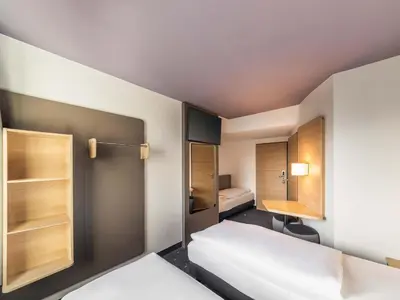 Ein Bett oder Betten in einem Zimmer der Unterkunft B&B Hotel Düsseldorf-City
