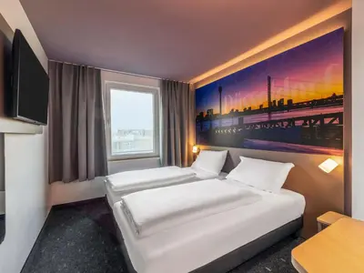 Ein Bett oder Betten in einem Zimmer der Unterkunft B&B Hotel Düsseldorf-City