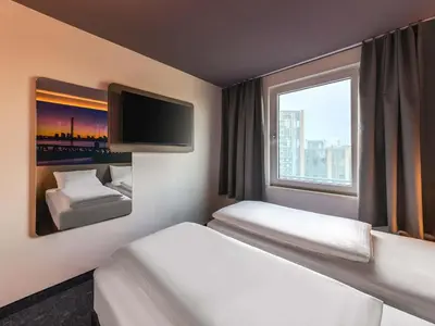 Ein Bett oder Betten in einem Zimmer der Unterkunft B&B Hotel Düsseldorf-City