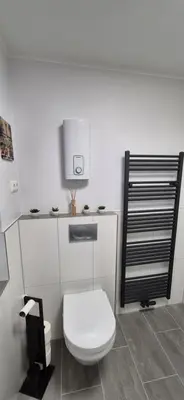 Ein Badezimmer in der Unterkunft Gemütliche Ferienwohnung Monteurzimmer Schultendorf