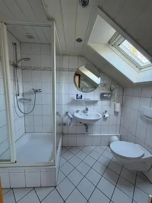 Ein Badezimmer in der Unterkunft Wirtshaus zur Heimlichen Liebe