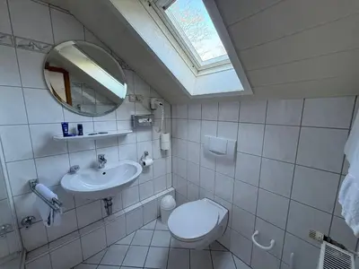 Ein Badezimmer in der Unterkunft Wirtshaus zur Heimlichen Liebe