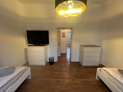Ein Bett oder Betten in einem Zimmer der Unterkunft Ferienwohnung Oberhausen, zentral und voll ausgestattet