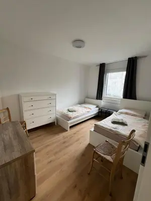 Ein Bett oder Betten in einem Zimmer der Unterkunft Ferienwohnung Oberhausen, zentral und voll ausgestattet