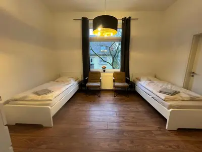 Ein Bett oder Betten in einem Zimmer der Unterkunft Ferienwohnung Oberhausen, zentral und voll ausgestattet