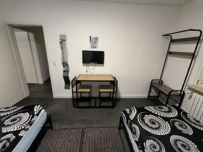 Ein Bett oder Betten in einem Zimmer der Unterkunft Mego Unterkünfte 3