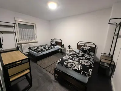 Ein Bett oder Betten in einem Zimmer der Unterkunft Mego Unterkünfte 3