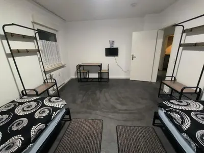 Ein Bett oder Betten in einem Zimmer der Unterkunft Mego Unterkünfte 3