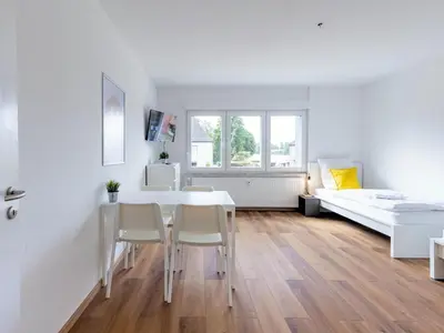 Ein Bett oder Betten in einem Zimmer der Unterkunft BudgetRoom 3 Schlafzimmer Workers Home