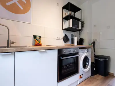 Küche/Küchenzeile in der Unterkunft BudgetRoom 3 Schlafzimmer Workers Home