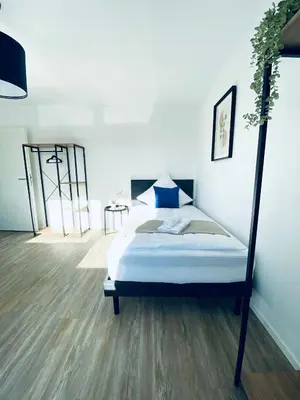 Ein Bett oder Betten in einem Zimmer der Unterkunft Komfortable XXL Teamsuite mit 1,20 Betten